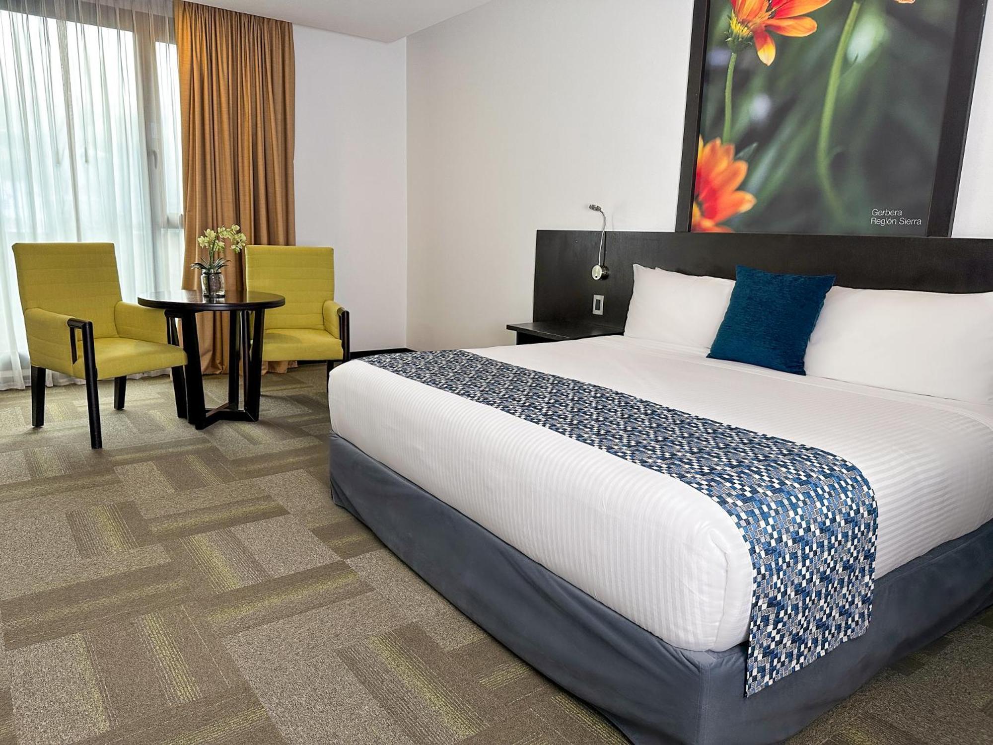 Wyndham Quito Airport Hotel Puembo Exterior photo A room at the hotel